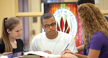 Students reading a book 