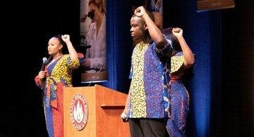 RIC students at a ceremony in Roberts Hall